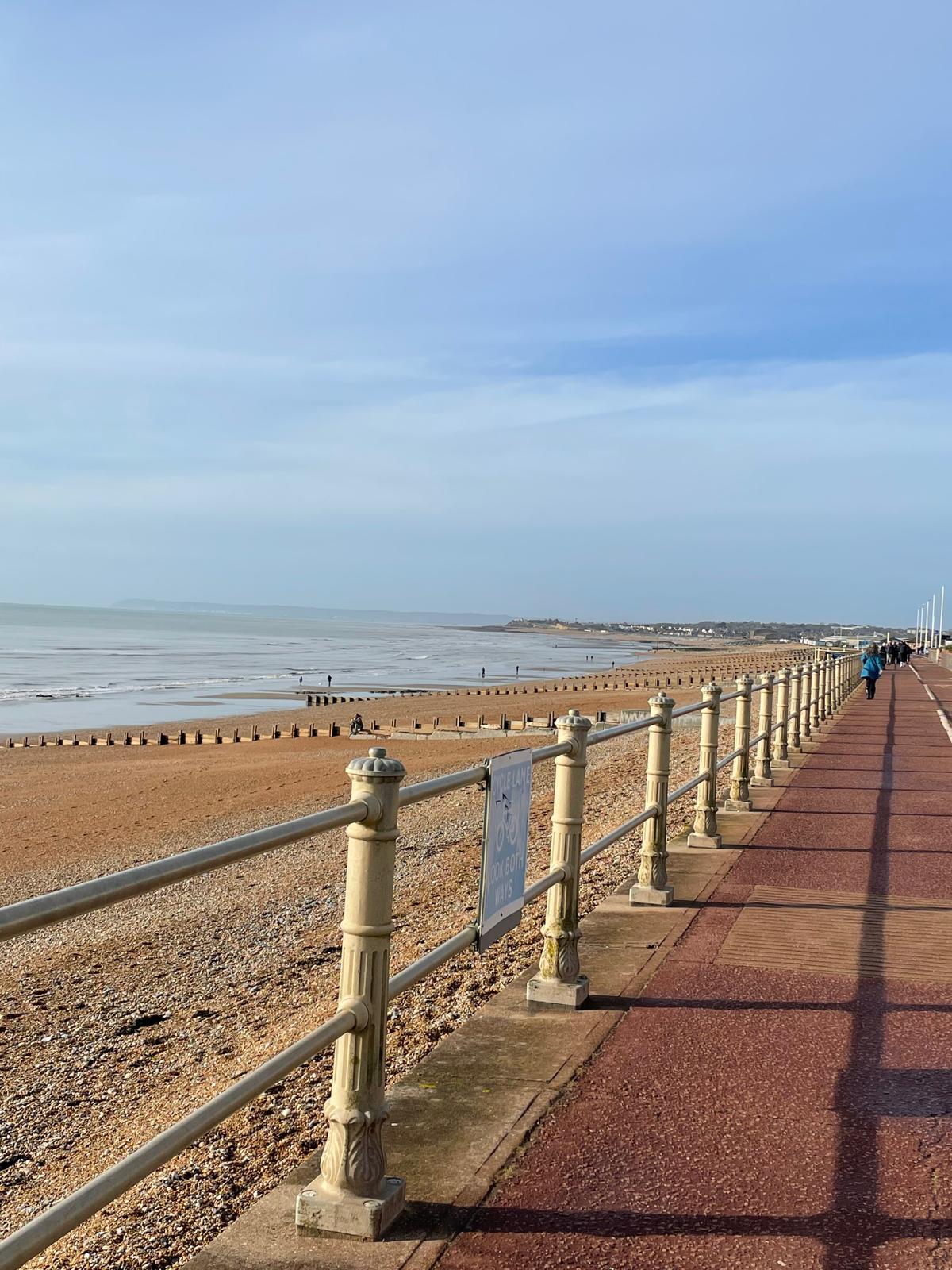 Hastings shingle beach and seafront — just two minutes from the Supermums Business Hub workspace